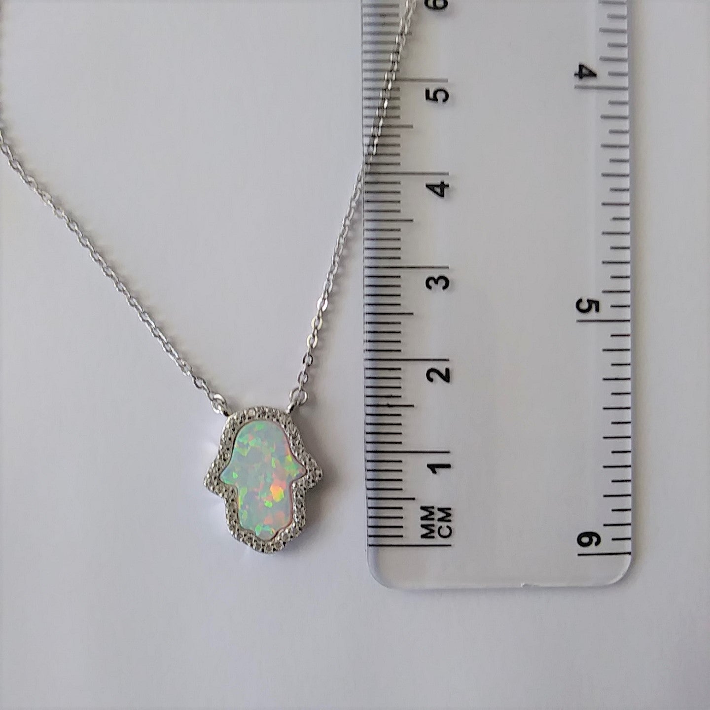 Sterling Silver and Simulated Fire Opal Hand Necklace